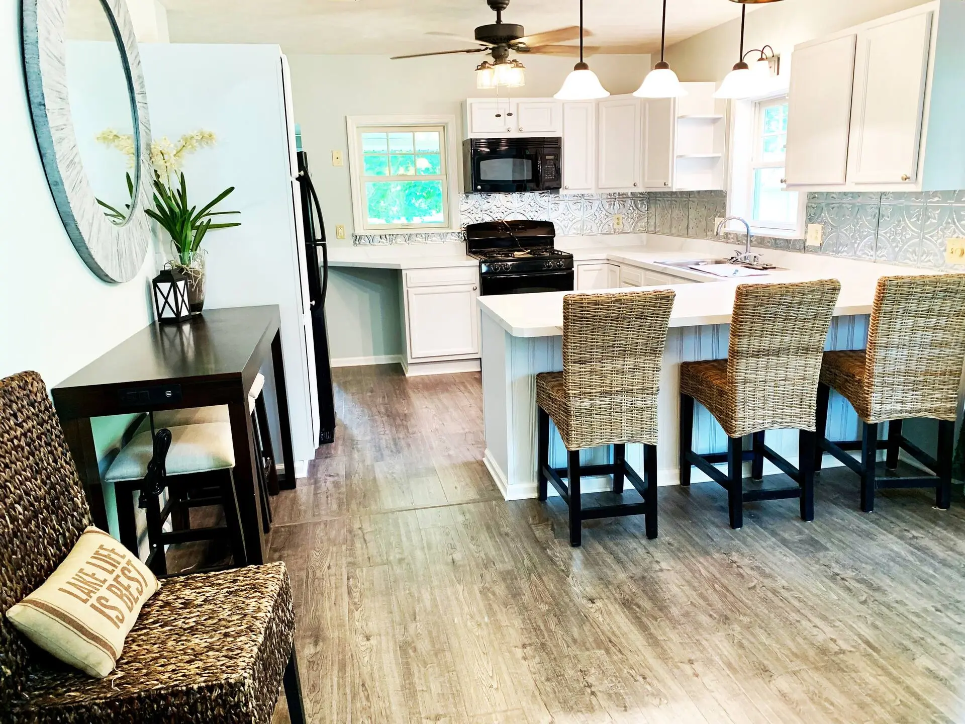 Open kitchen and dining space inside Barefoot Bungalow